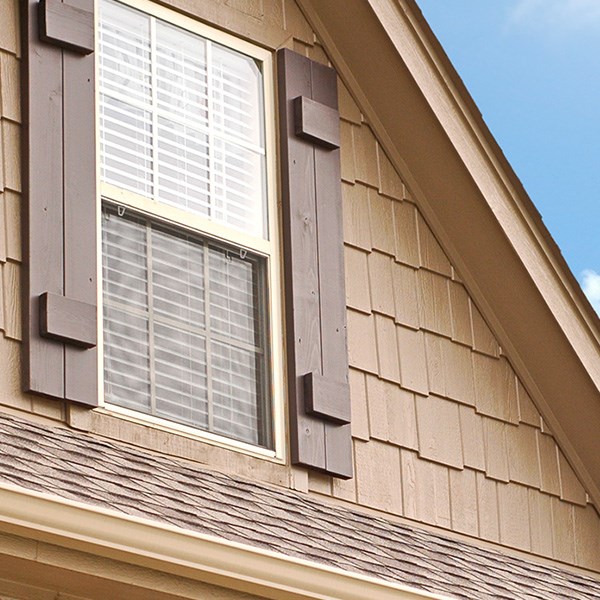 home in norwood with new gutters installed