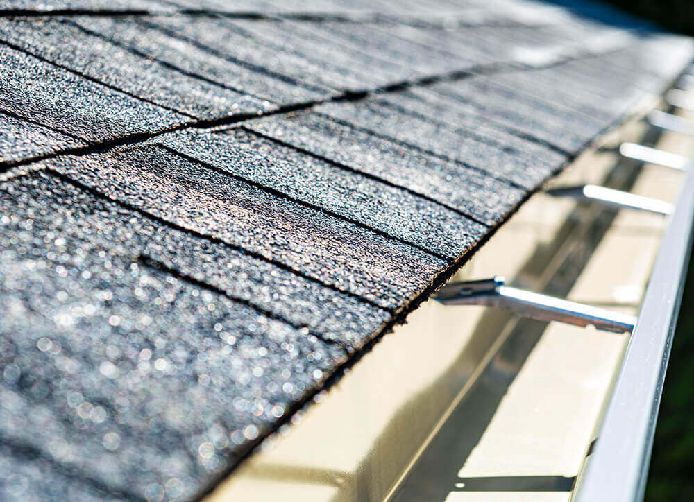 new gutters installed on a home in natick ma