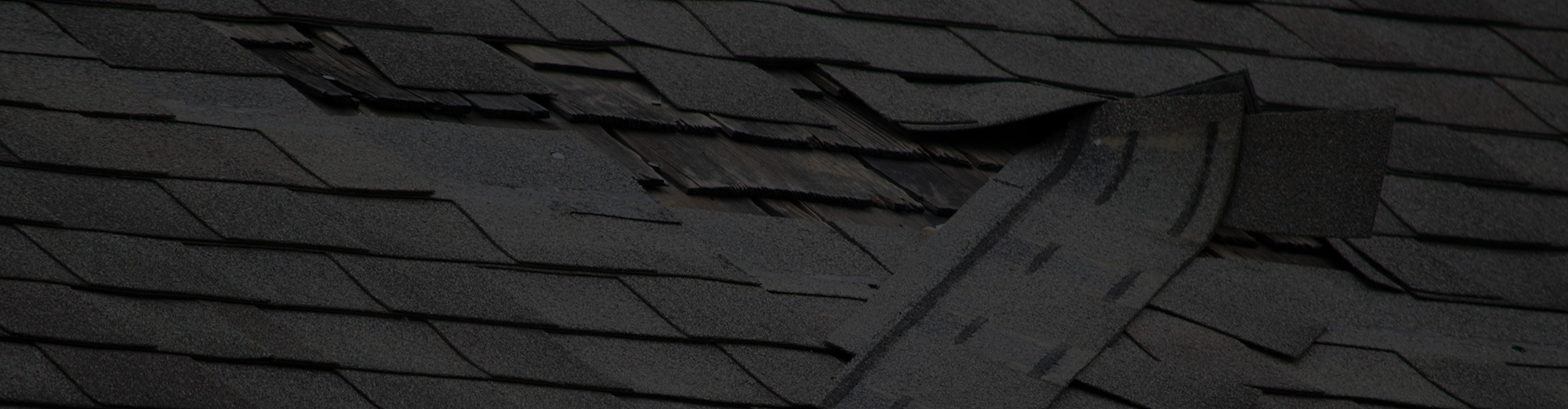 Damaged residential roofing system