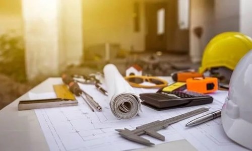 table with construction tools - Couto Construction