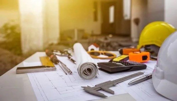 table with construction tools - Couto Construction