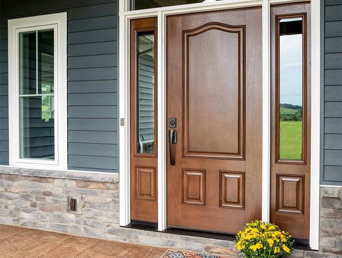 Replacement entry door installation on home in Southeast Massachusetts