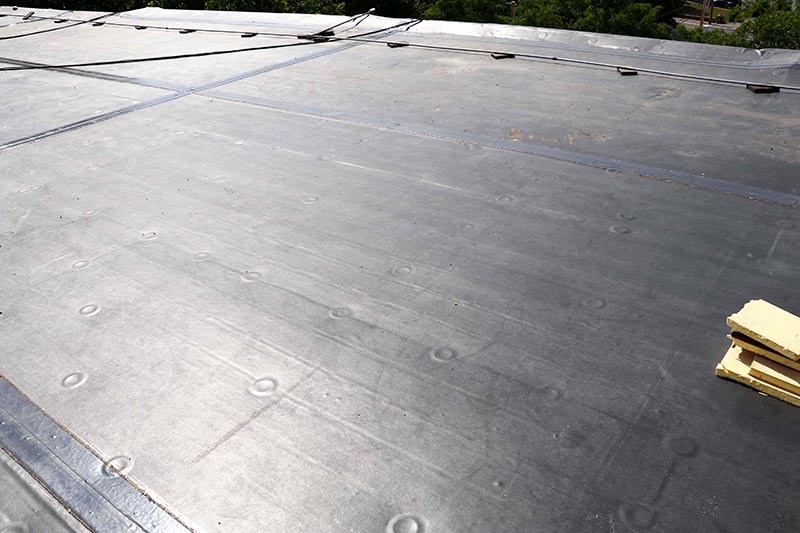 dark gray flat roof replacement