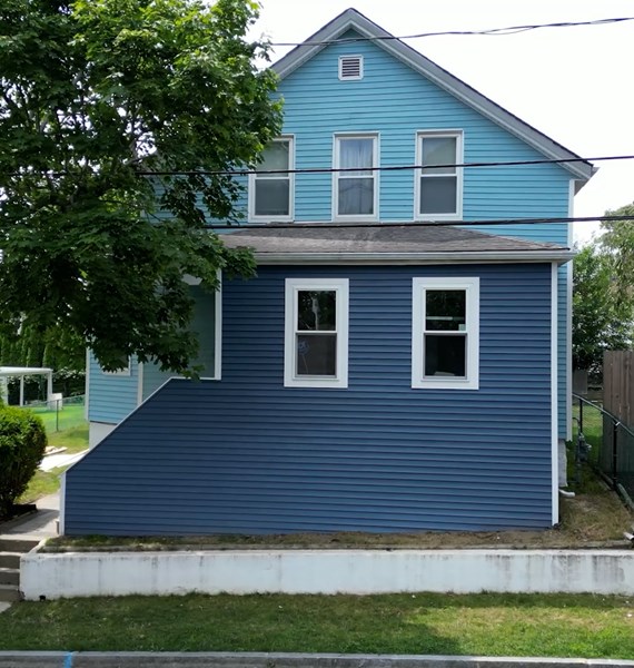 Blue fiber cement siding replacement services in Fall River