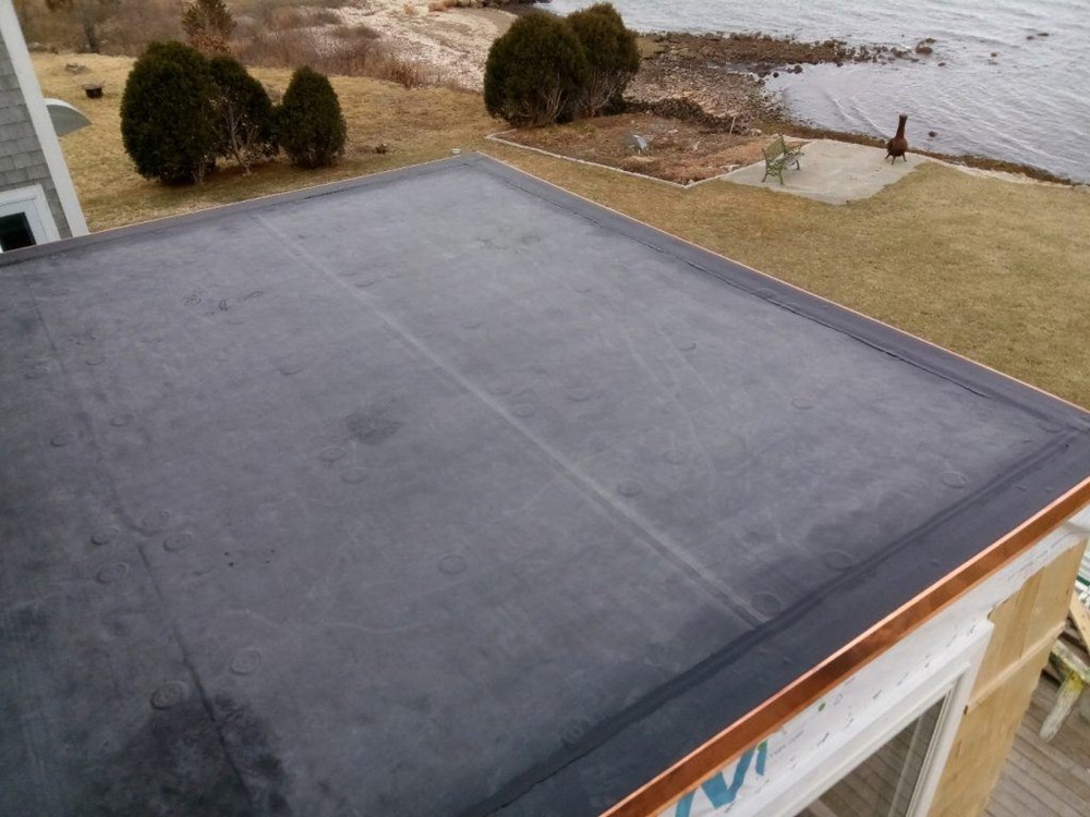Residential garage flat roof replacement in New Bedford, Massachusetts